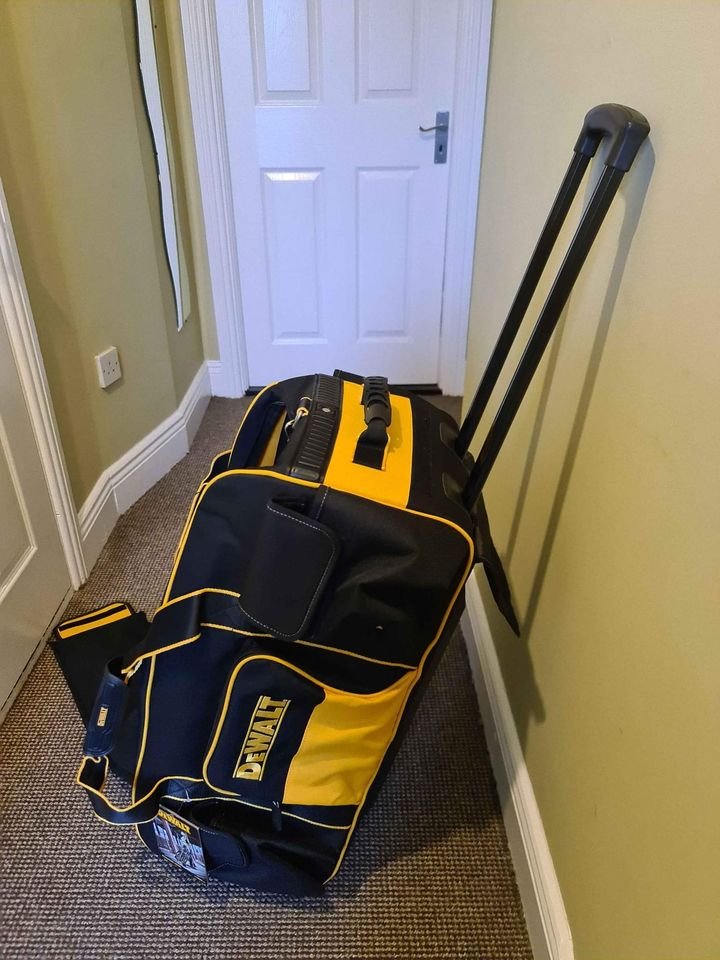 Dewalt tool bag with wheels new.